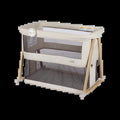 Rest-And-Romp Rocking Bassinet